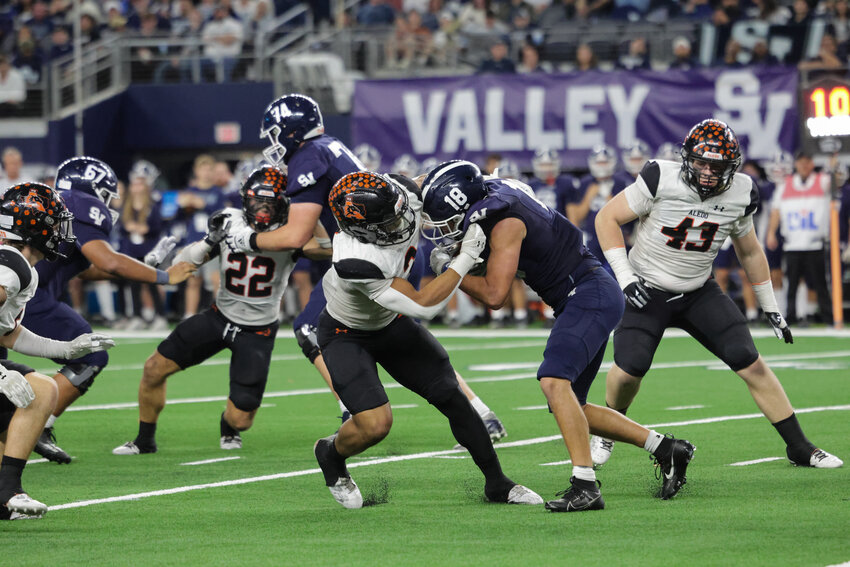 Defensive MVP Davhon Keys works past a Smithson Valley defender during the State championship game.