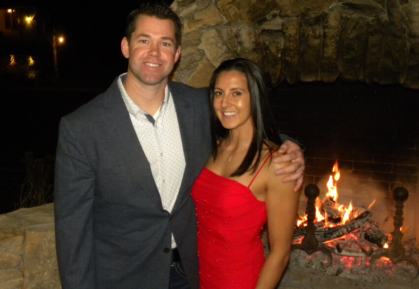 Charles and Natalie Paul warmed up in front of the fireplace at The Brooks.