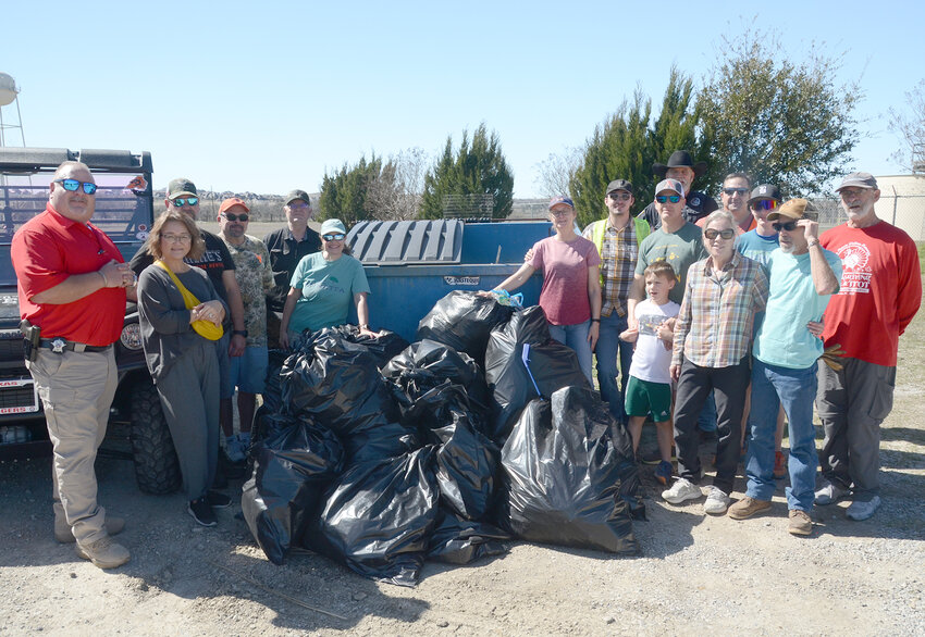 Annetta families and area friends picked up 33 bags of trash Saturday, Feb. 24 along the roadsides of Annetta. Starting from Annetta City Hall and fanning out over the area, the group returned to enjoy a barbecue lunch together.