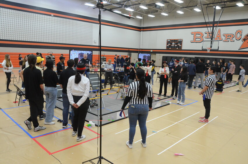 Teams compete against the clock with judges and officials grading  maneuvers and accuracy.