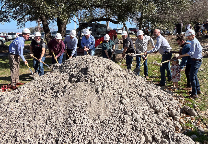 Participating in the groundbreaking for Trinity Bible Church’s new worship center on March 3 were (from left) Lin Bearden (TexasBank), Adam Feriend (JRJ Construction), Dennis Connelly (Trinity Bible Church, Elder), Shelby Hanks (Trinity Bible Church, Elder), Tom Howorth (Trinity Bible Church, Founding Member), Fred Harper (Trinity Bible Church, Former Elder), Thomas Vanover (Trinity Bible Church, Elder), James Frailey (Trinity Bible Church, Elder), Jon Sherman (Trinity Bible Church, Pastor Emeritus), Joel Carpenter – Trinity Bible Church, Worship Pastor), Eric Kuykendall (Trinity Bible Church, Senior Pastor.