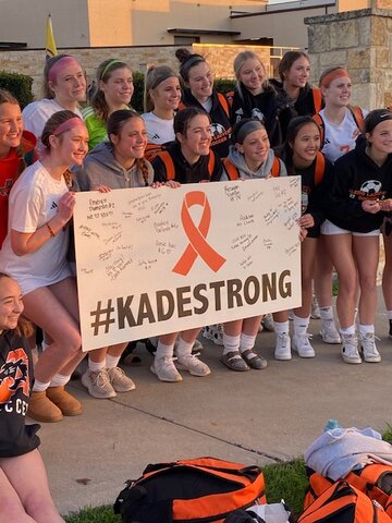 Members of the Aledo Ladycats soccer team show their support for Kade Pruitt, a fellow student who has been diagnosed with leukemia.