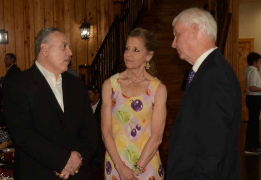 Sam and Gail Spadaro visit with Dan Clifton.