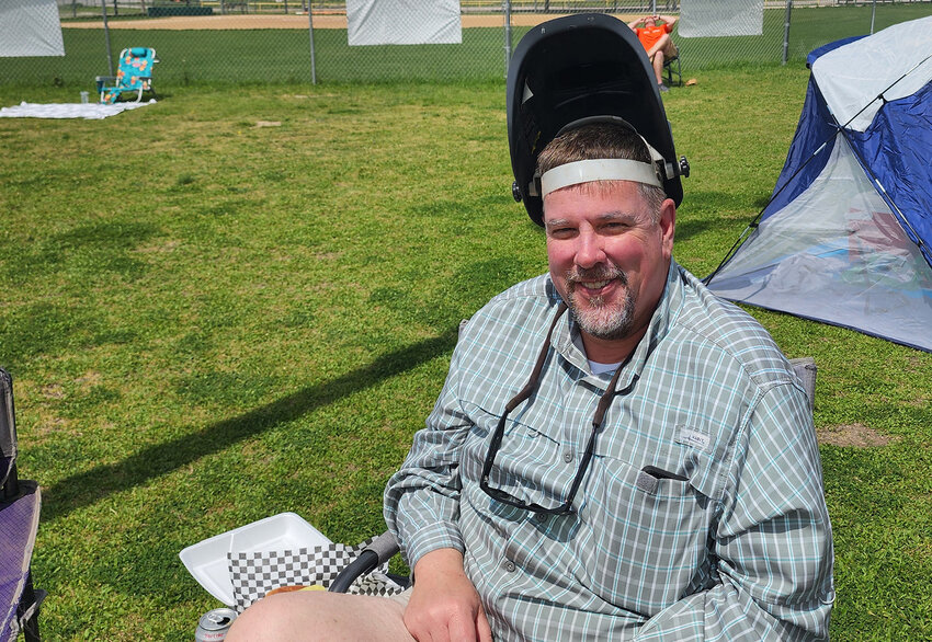 Tom Tenseth of Weatherford brought a welding mask to watch eclipse at Total Eclipse of the Park.