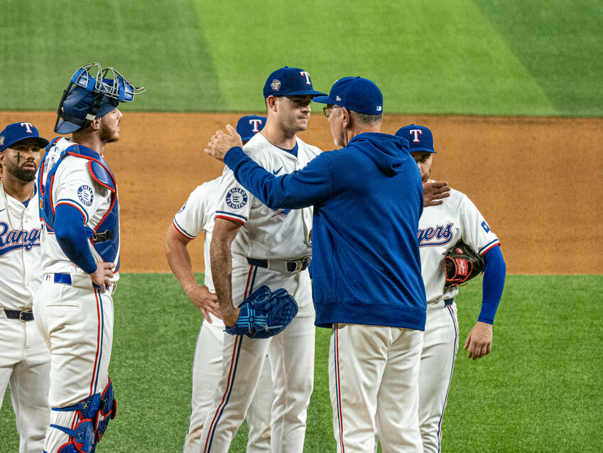Manager Bruce Bochy congratulates Cody Bradford on a stellar pitching performance against the Houston Astros on Friday, April 5. Bradford threw 7.1 innings while giving up just two hits and one run in his second win of the season.