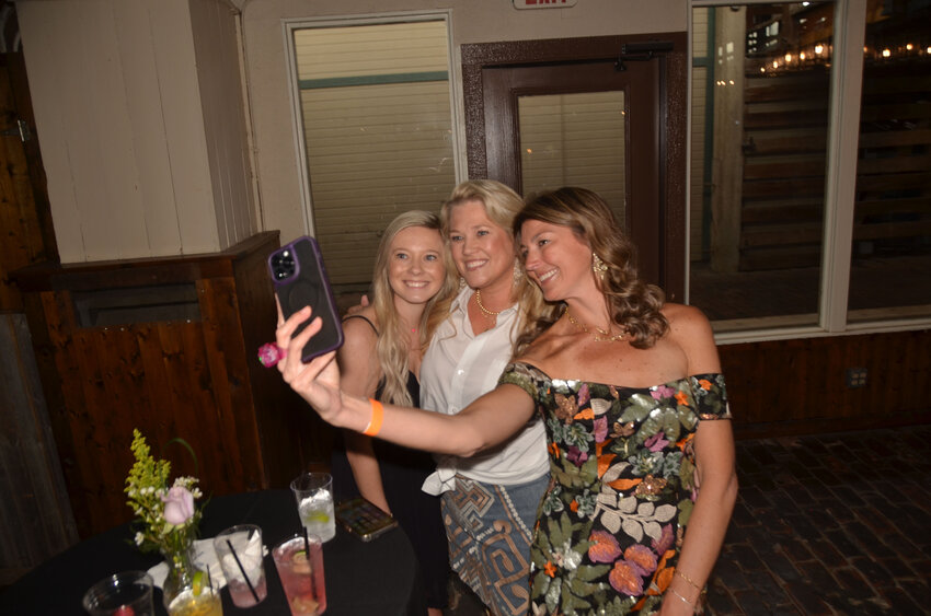 Brooke Howerton, Kendall Smith Sadler and Brittany Hill pose for a souvenir selfie.