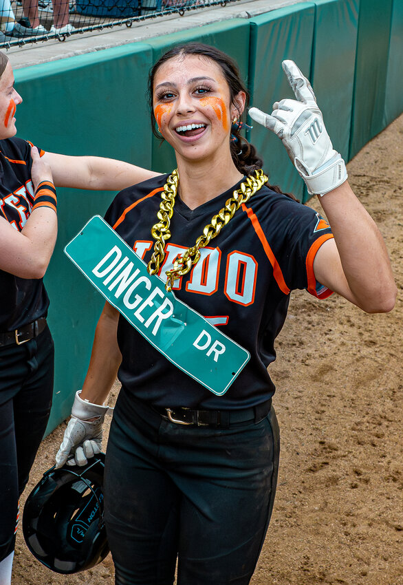 Ana Flores celebrates following her two-run homer in the top of the seventh inning. Kennis Marx and Taylor McKean also homered as part of a four-run rally to propel Aledo to victory.