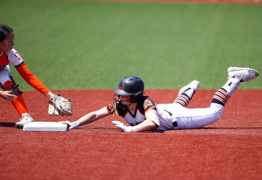 Aledo sophomore Jordyn Edington (1) arrives steals second base, putting the game-tying run in scoring position in the bottom of the seventh inning of the Class 5A state softball semifinal between Aledo and Harlingen South, on May 31, 2024 in Georgetown. Harlingen South won, 1-0.