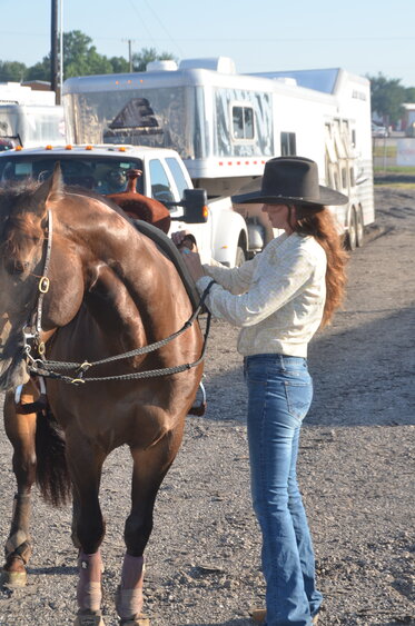 Barrel racer Helen Nowosad of Stephenville readies her ride for a shot at part of the Parker County Rodeo prize money.
