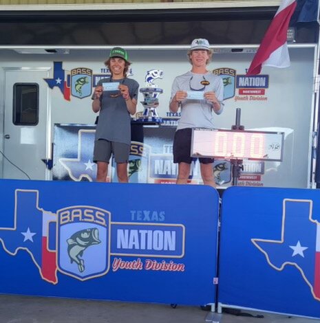 Aledo’s Marc Cerja (left) and Miller Hill display their winnings during a recent Bassmaster competition.