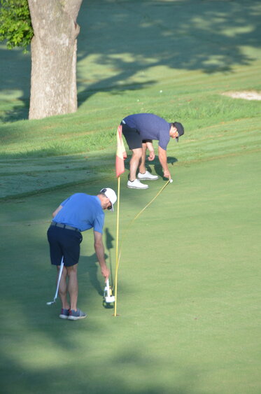 In order to determine closest to the pin, Squaw Creek Golf leaves measuring tape at the greens in case there is a close call.
