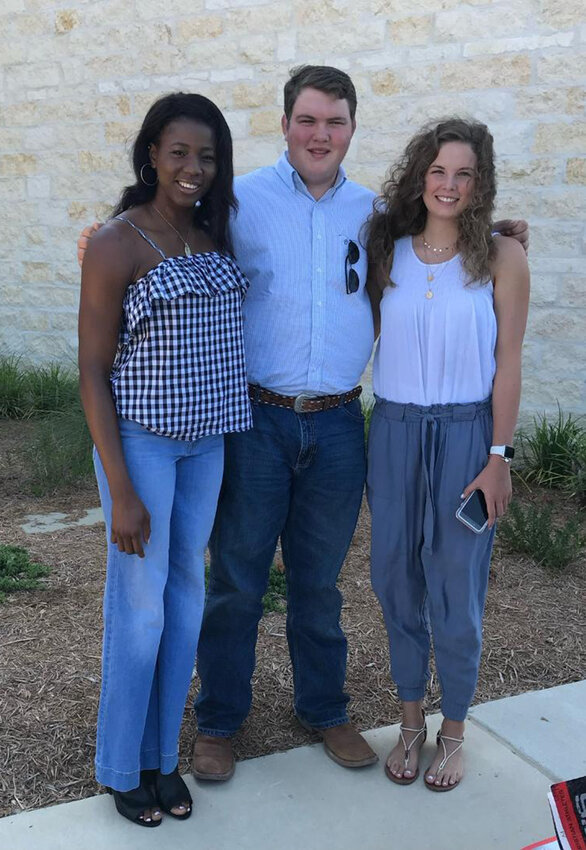 Lucy Ibeh is shown with Matthew and Elizabeth Allanach while Lucy was staying with.the Allanach family in Aledo. Elizabeth was a teammate of Lucy's on a select.basketball team.
