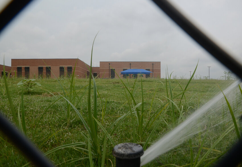 Looking over the McKinney Elementary School sports field to the east playground.