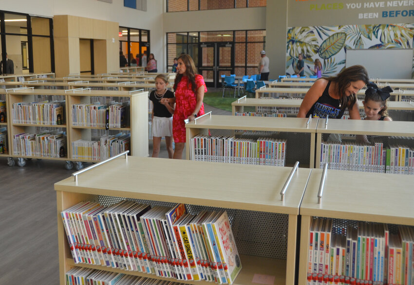 Library shelves are low for easy access and so students can see across the room.