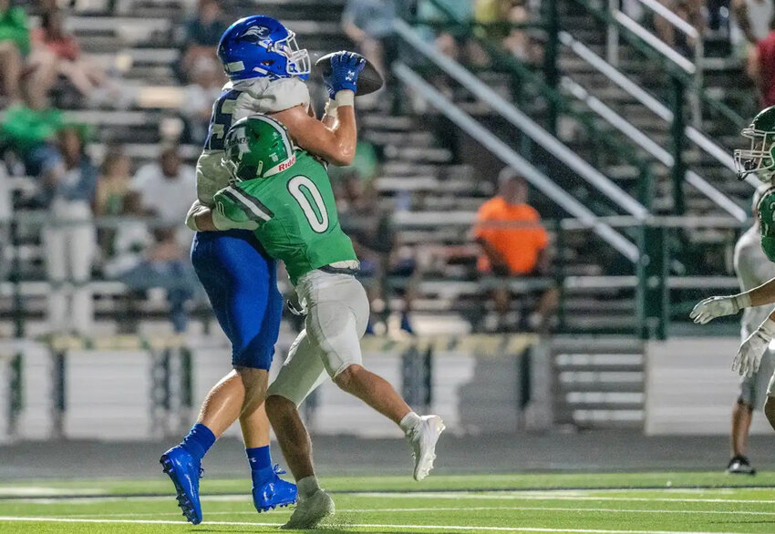 Tight End Harrison McMillan snags a pass.