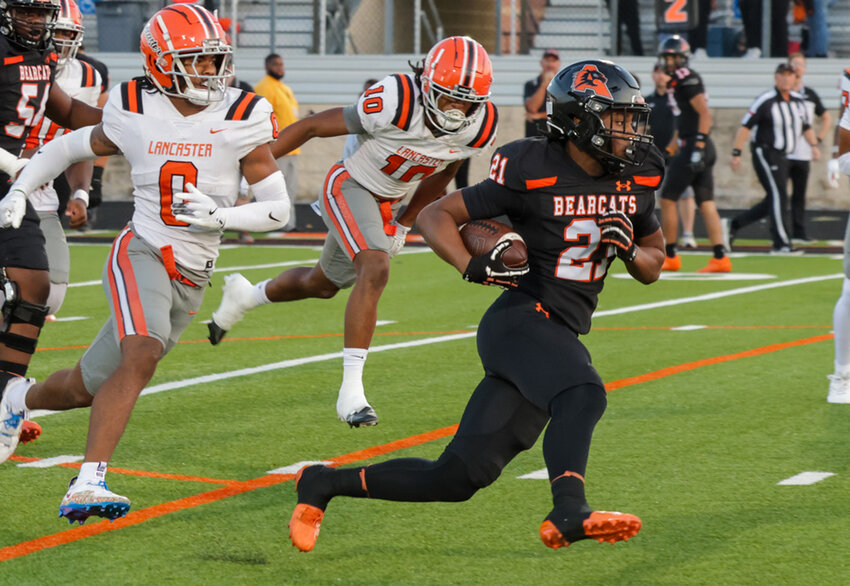 Kaden Winkfield (21) carried the ball 14 times and scored a touchdown against Lancaster.