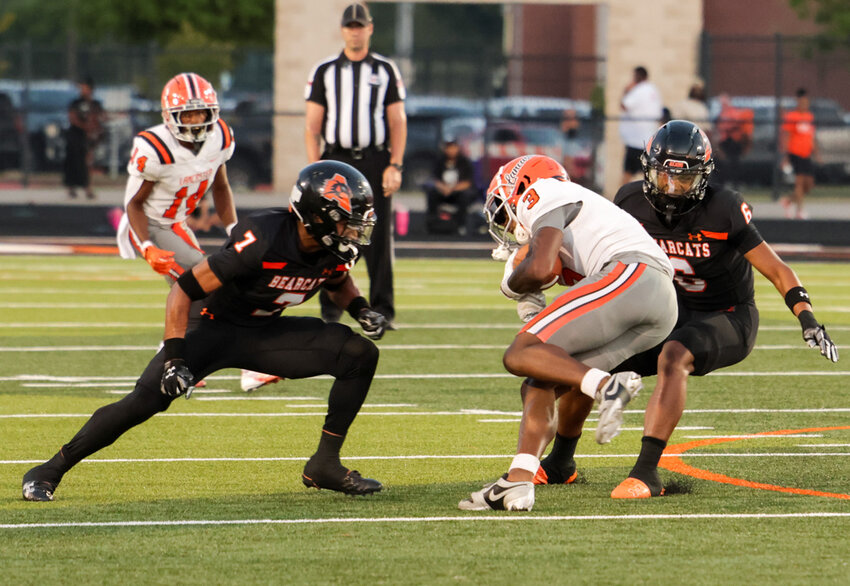 Cornerback Adrian Fuller (7) and safety Lamel Swanson (6) converge on a Lancaster ball carrier. Fuller had two interceptions in the game.