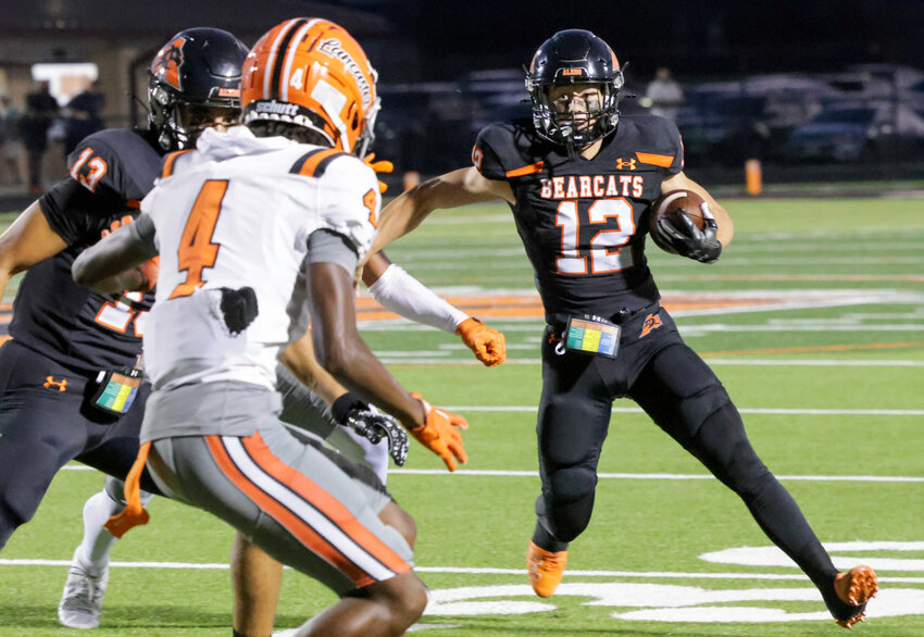 Lincoln Tubbs (12) evades a defender.