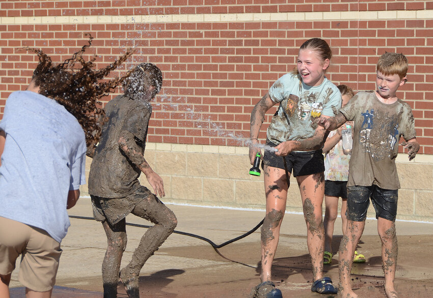 Getting clean is part of the fun for Stuard Mudventure fans.