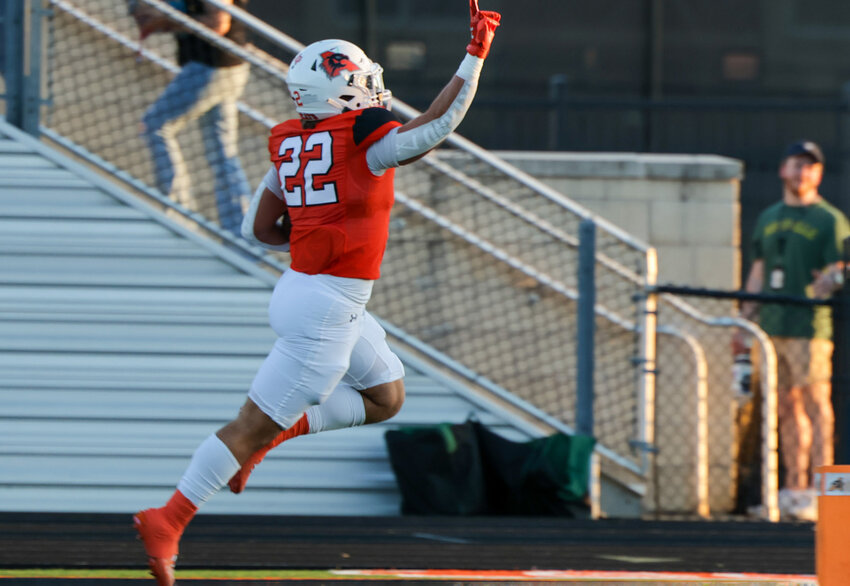 Senior Linebacker Ben McElree (22) scooped up a fumble and returned it 35 yards for the game's first score.