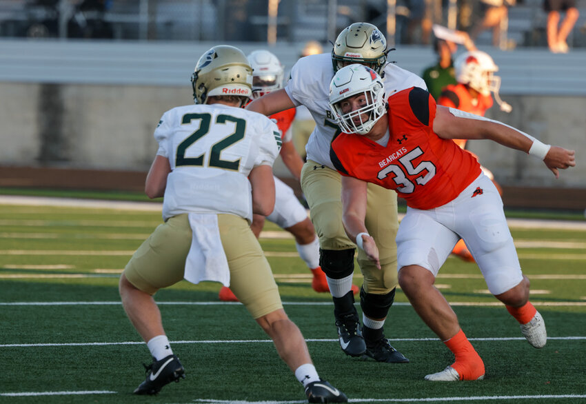 Carson Dempsey (35) applies pressure in the game against Birdville.