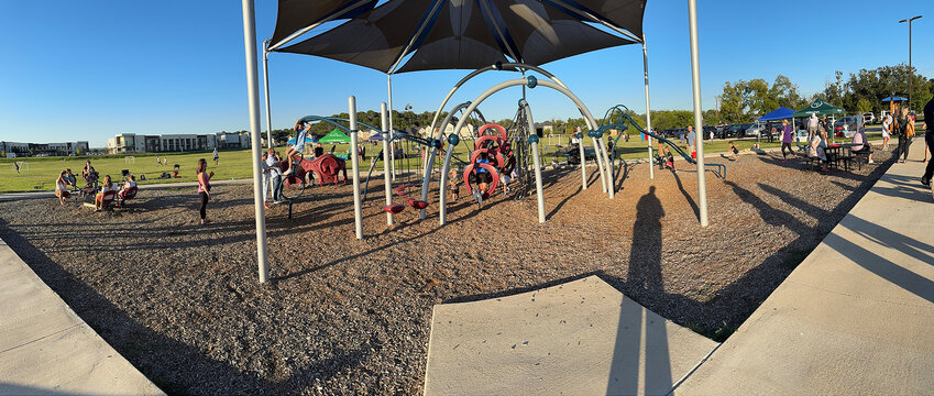 The playground at King's Gate Park was well utilized as shown in this panoramic photo.