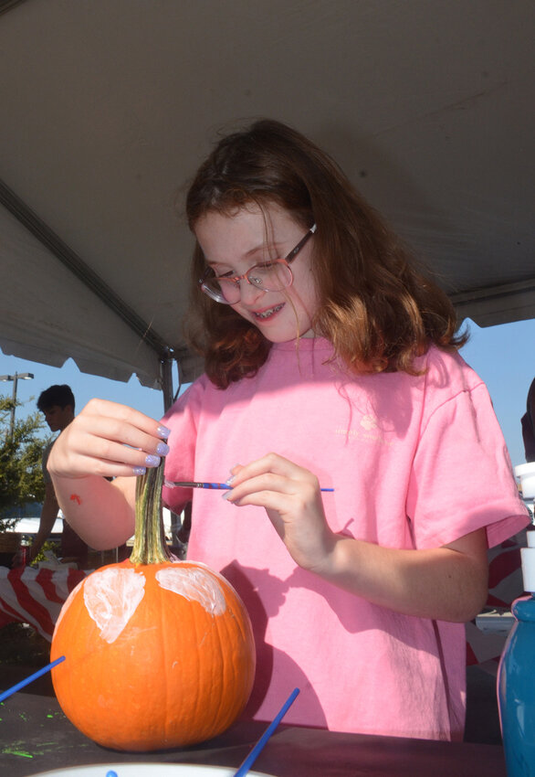 Vandagriff third-grader Emmy Corcia expands her artistic talent onto a pumpkin canvas.