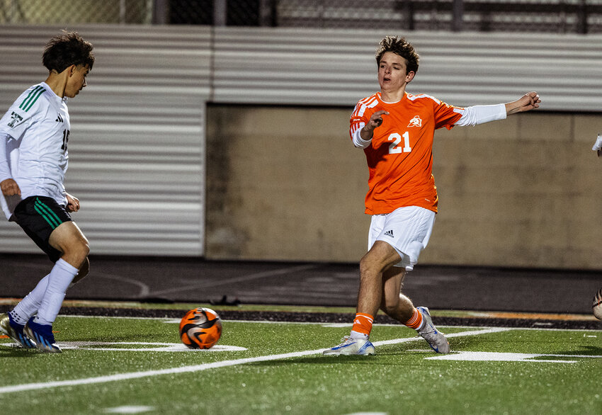 Elliot Smith evades Trimble Tech defenders. Smith scored a goal in the contest.