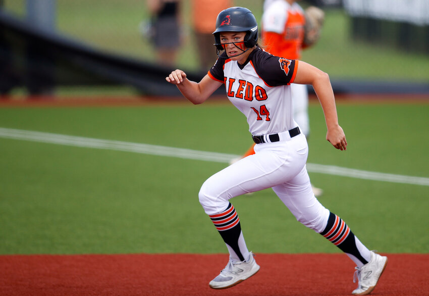 Kyleigh Pawlak runs from first to second base during the Class 5A state softball semifinal.