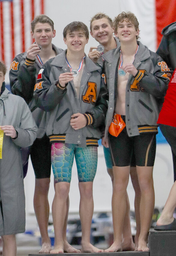 The boys 400 Free Relay of (front) Brayden DeBoer and Tyler Jackson and (back) Ian Perez and Kale Roberson qualified for state and set a school record at regionals.