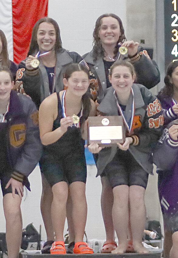 The girls 200-yard Free Relay of (front) Mackenzie Oligschlaeger and Haley Roberson and (back) Victoria Crewsand  Julia Gordy set a school record in qualifying for state. The quartet also qualified in the 400 free relay.