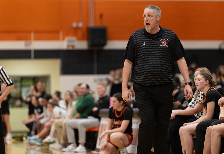 Ladycats head coach Donny Ott gives instructions to his team during the fourth quarter of Aledo's bi-district win.
