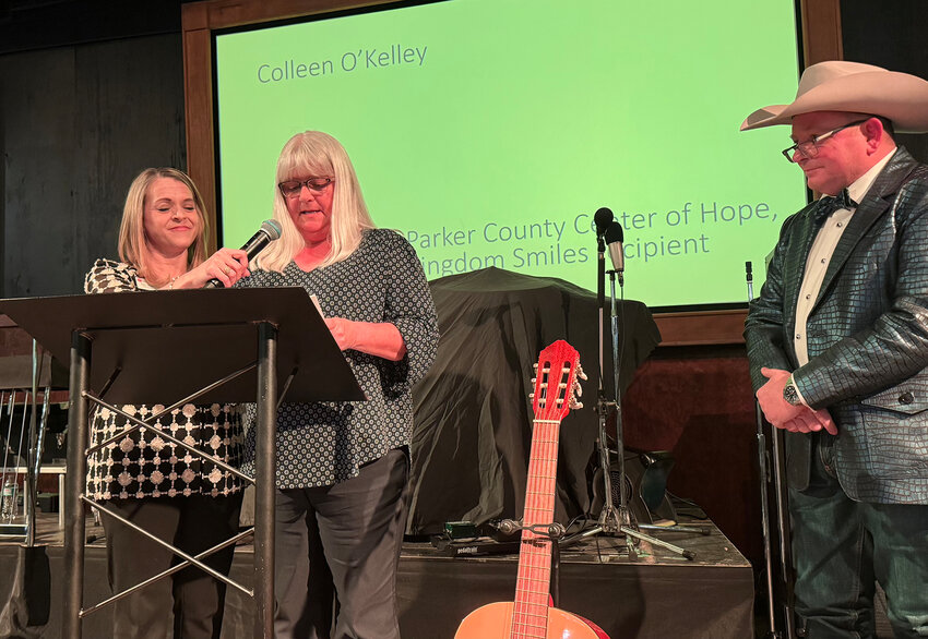 Colleen O'Kelly provided testimony of the benefits she recieved at the Center of Hope, one of the beneficiaries of the PCHF. Also shown are Center of Hope Director Staci Markwardt and Shane Cartwright of the Department of Public Safety.