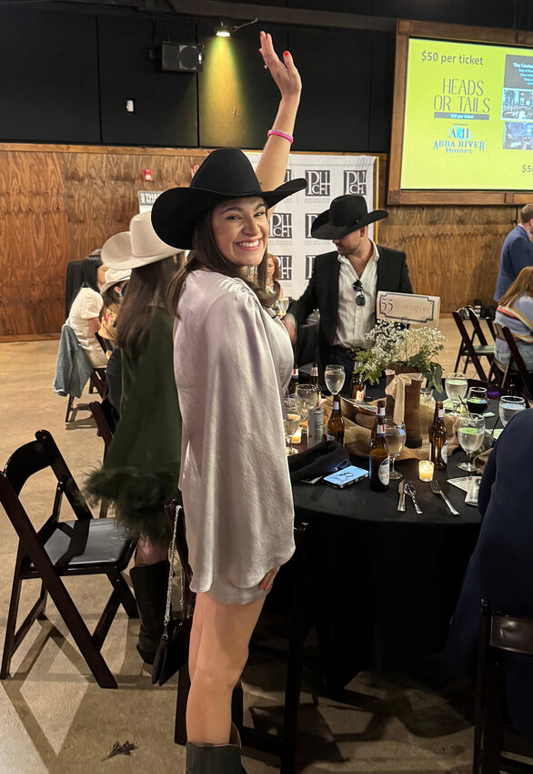 Alex Helms participates in a game before the auction begins.