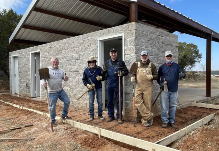 Shown are (from left) Rodney Garrard of Glen Lake, Don Little, Eric Kupper, Russell Smith, and Phil Kite at completed walkway forms.