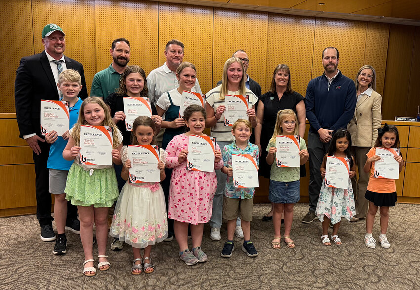 Bearcats of Character are shown with Aledo ISD board members.