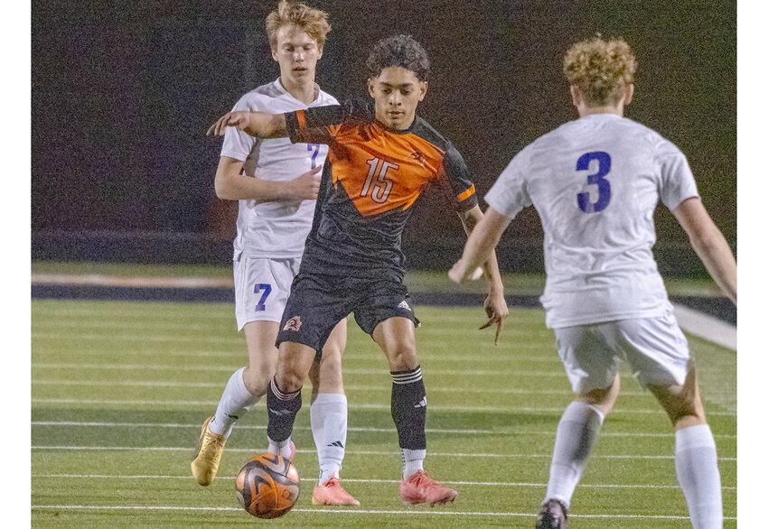 Evan Randriamahefa plots his next move after stealing the ball during a home match on Feb. 7.