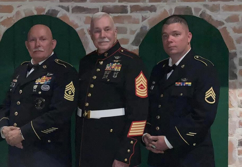 David Hart, right, is shown in his Texas Guard dress uniform.
