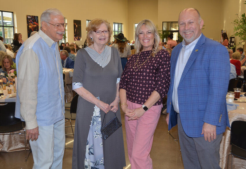 Fred Barber, Trinity Christian Academy founder Dr. Marsha Barber, Elizabeth Baker, and Weatherford College vice president of institutional advancement Brent Baker visit before the Grace House banquet.