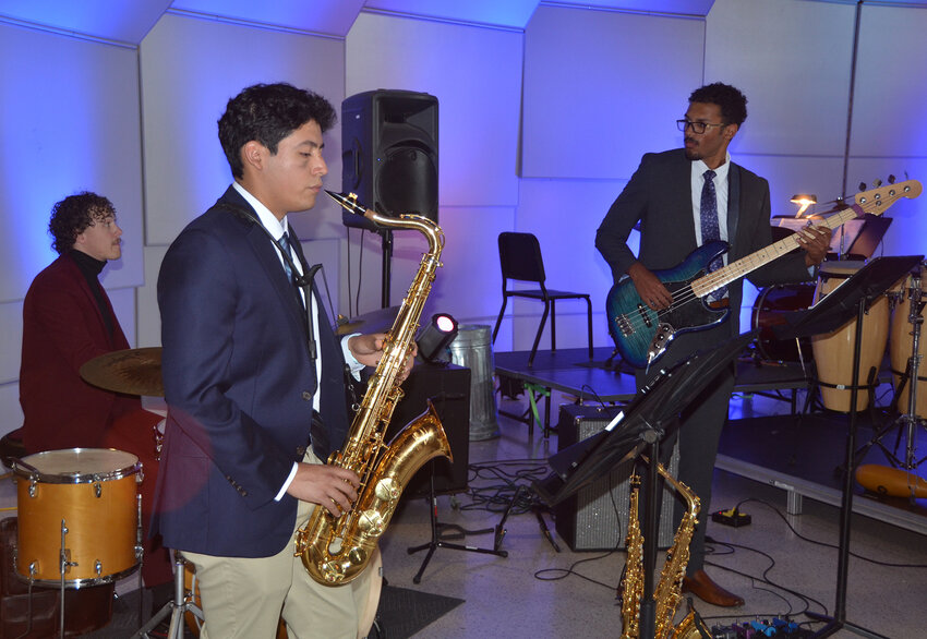 The Jags trio, Gavin Haddox, drums, Jerry Alazaran, Sax, and August Lambert, bass.