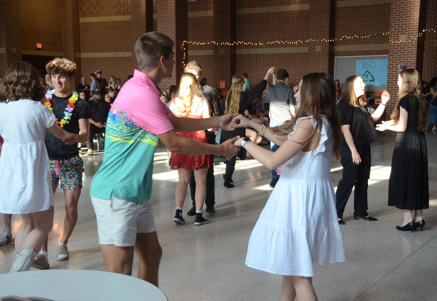 Students swing to the music.