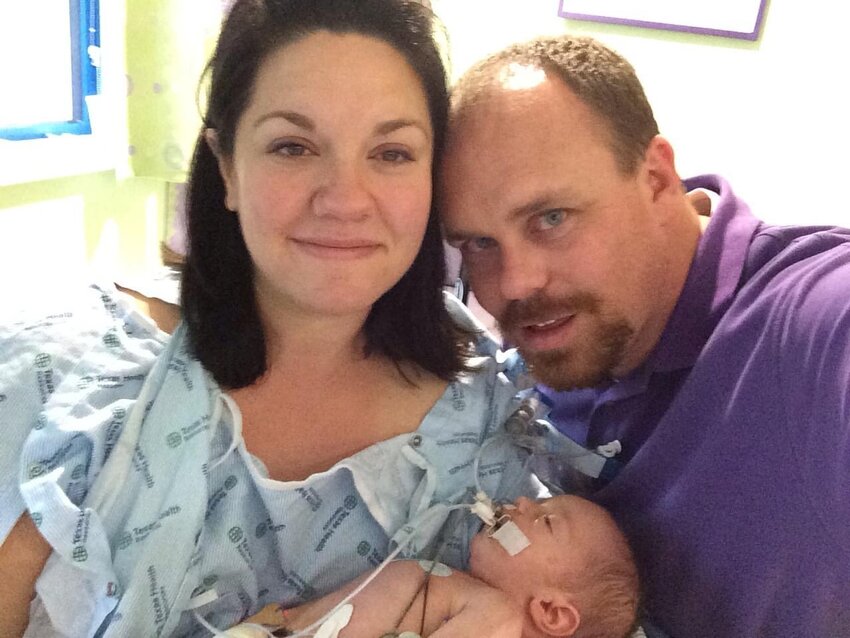 Peyton Lauderdale, her husband, and their son James.