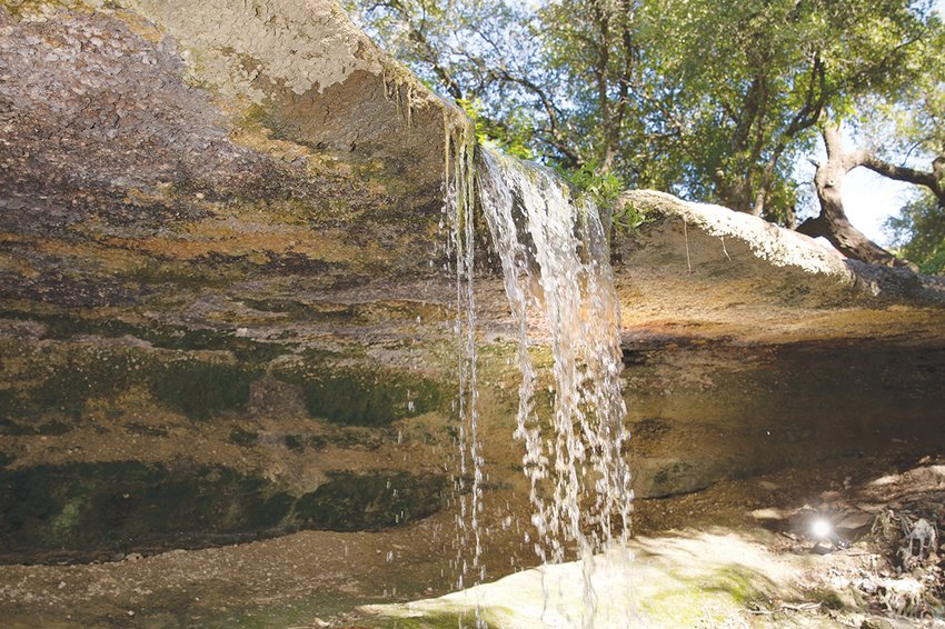 A limestone formation near the Aledo Community Center provides a mini waterfall after heavy rains.