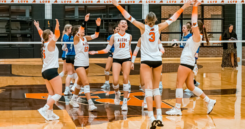 Senior Send-off: (L to R) Class of 2025 seniors Logyn Denbow, Ella Isbell, Caroline Pruett, Morgan Estevez, Ella Meador, Coach Claire Gay, Kenrie Pruitt, Hailey Lowe, Ava Reding, and Kinley Elms pose for a photo together prior to the match against Brewer as the Ladycats celebrate Senior Night on Tuesday, Oct. 8.