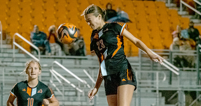 Ainsley Elmore attempts to score with a header off a set piece during the second half of the Ladycats
