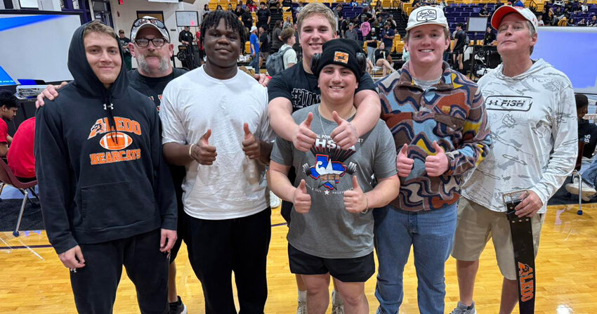 Aledo’s regional-qualifying powerlifters are (from left) Chase Wilburn, Coach Stephen Reves, Omari Din-Mbuh, Kruger Summers, Anthony Flowers, Luke Campbell, and Coach Brad McCone.