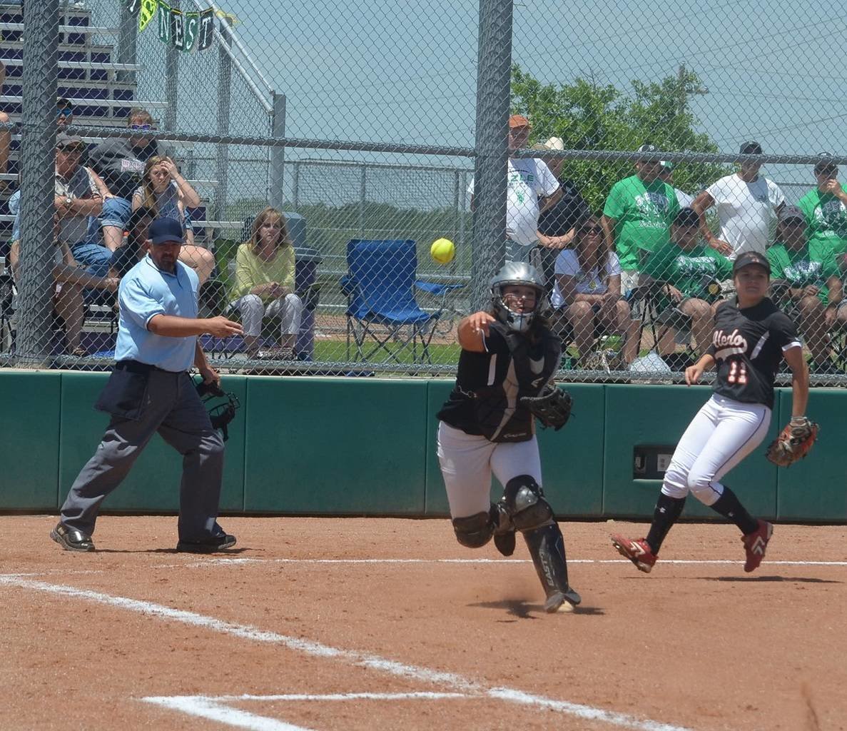 Aledo senior catcher Landri Mays throws to first base during the Ladycats' win over Azle. The Ladycats and Bearcats will continue playoff action beginning Thursday. The Ladycats will face Birdville in a best-of-3 regional quarterfinal series, while the Bearcats will play Wichita Falls Rider in a best-of-3 area series.