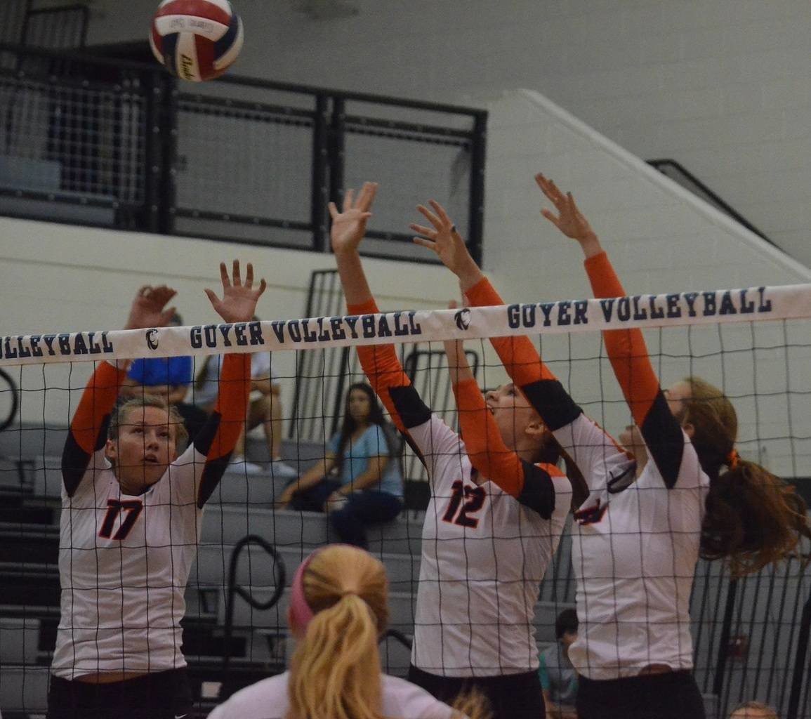 Aledo's front row of (from left) of Erin Weiss, Emily Smith and Amanda Norman put up a block Tuesday night during the Ladycats' victory over Denton Guyer in a non-district volleyball match played at Denton Guyer.
