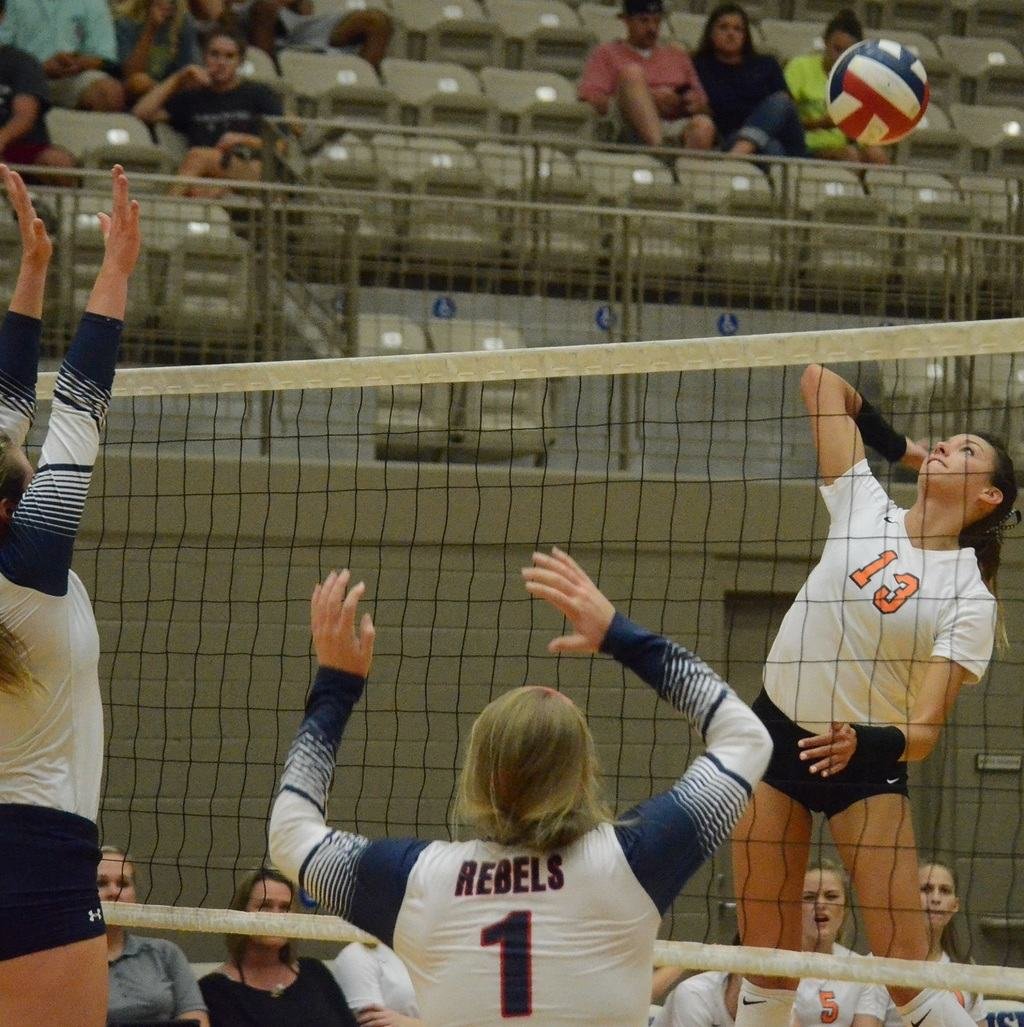 Aledo senior hitter Maddie Goings sends down a kill in the opening game of the Ladycats' sweep of Richland Tuesday night at Thomas Coliseum. Goings led all hitters with 17 kills.