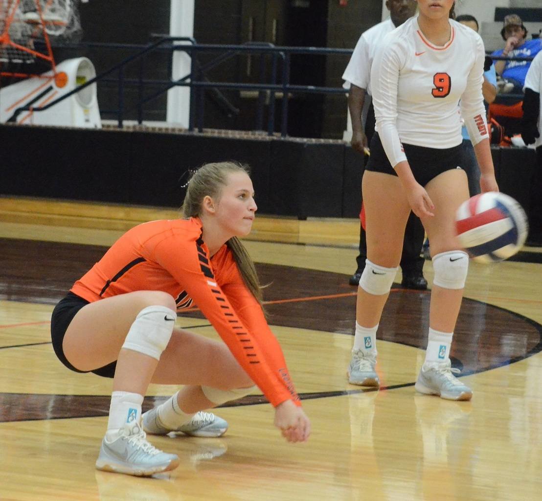 Aledo junior hitter Sydney Casey digs a ball during the Aledo/Boswell match. The Ladycats will continue District 6-5A play at 6:30 p.m. today at home against Eaton.